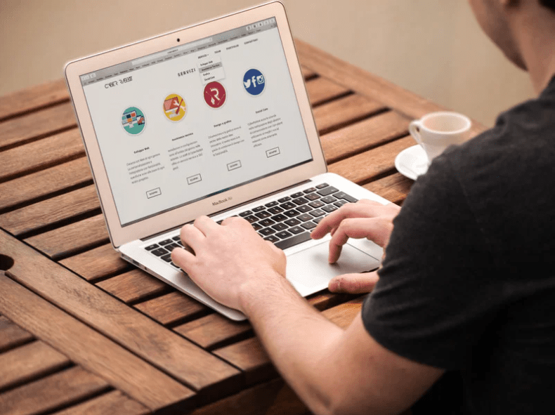 person working on laptop web dev
