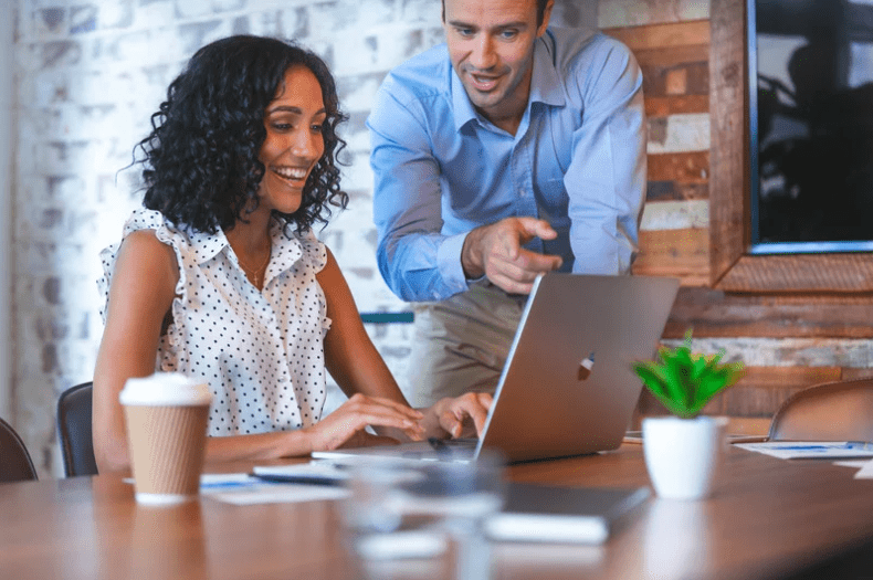 two people on computer