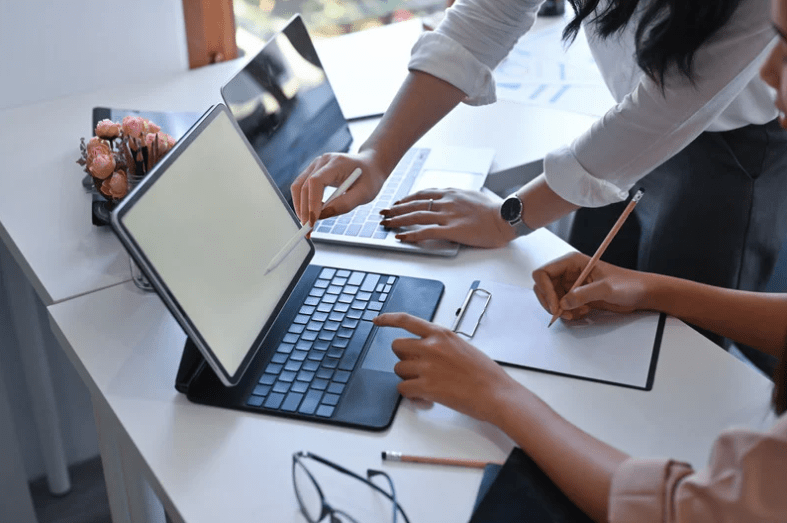 two people working web design agency